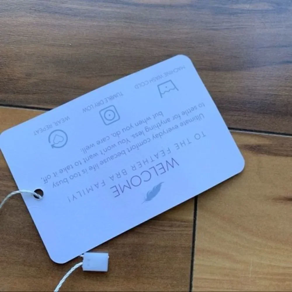 feathers measurements tag