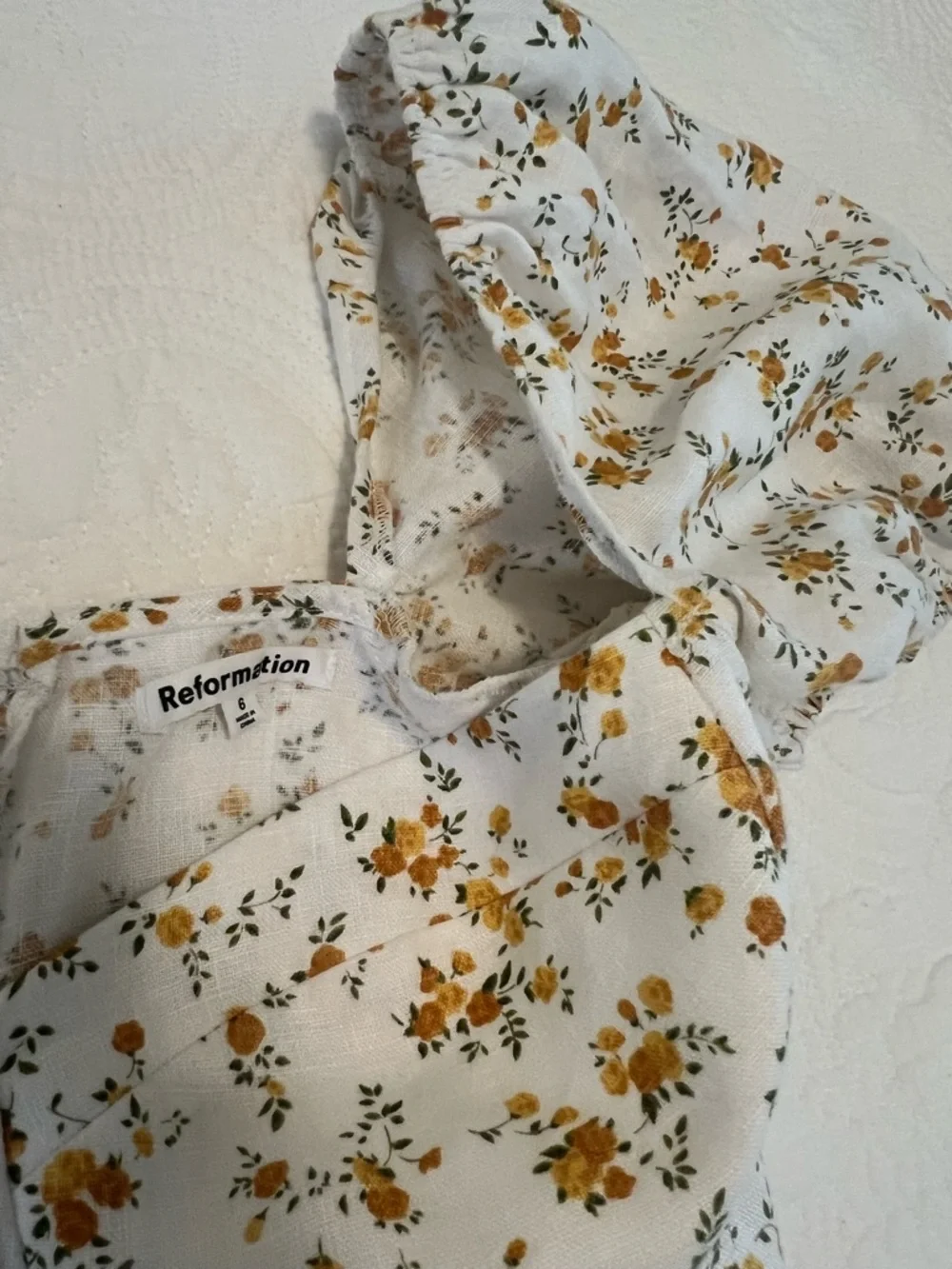 Reformation Andra linen top in orange/yellow floral print, size 6