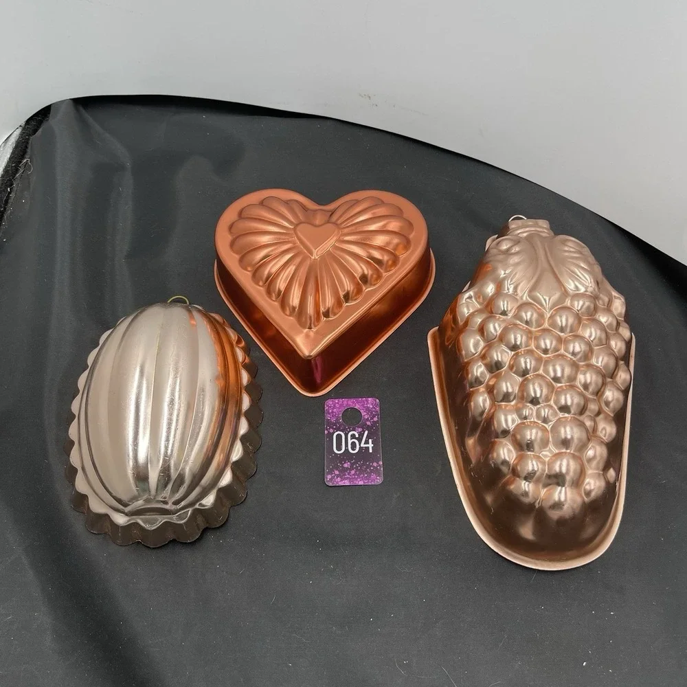 Three metal  Jell-O‎ wall hanging mold