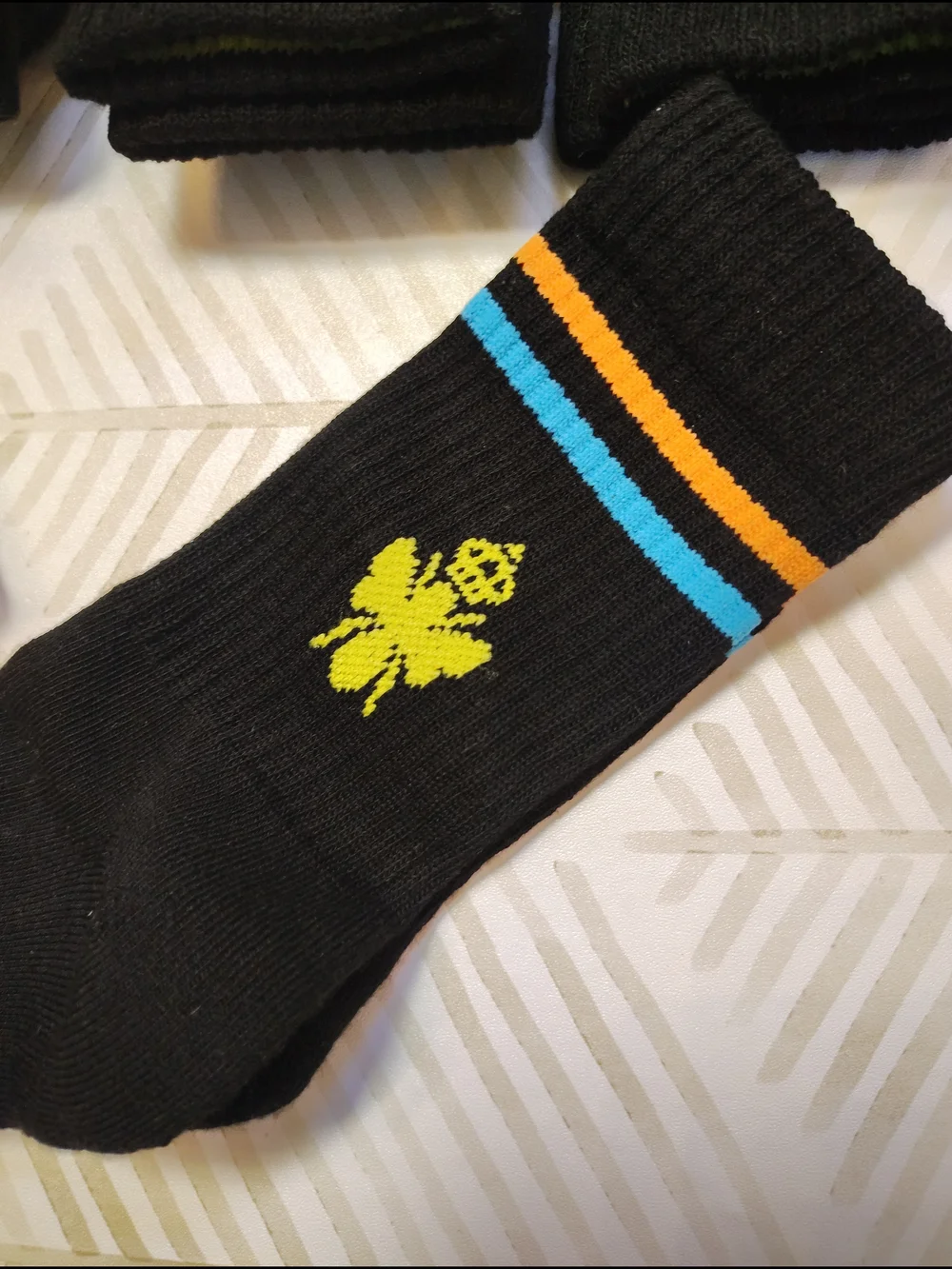 Bombas Black Crew Socks with Orange, Blue and Lime Accents Xs