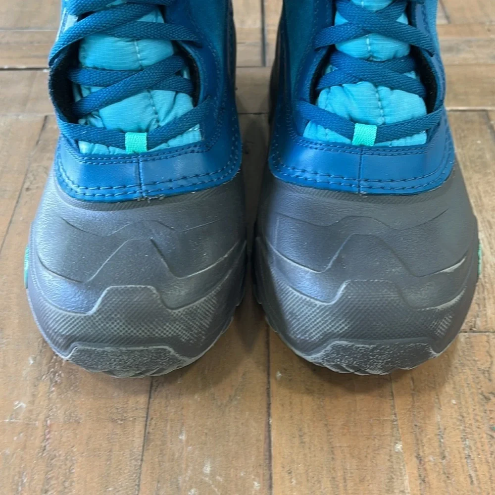 The North Face turquoise quilted