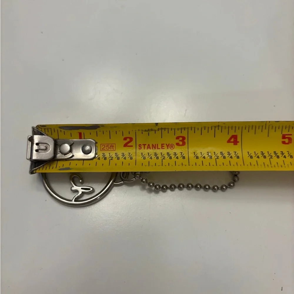 Coach round silver script spellout metal hang tag purse charm chain