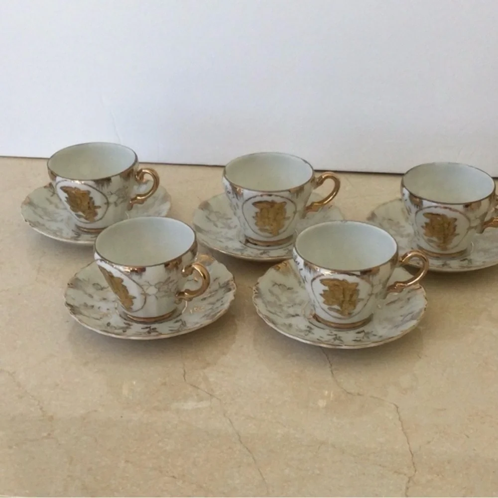 Vintage Sterling China Japan Porcelain 5 Demitasse cups and saucers. . ##