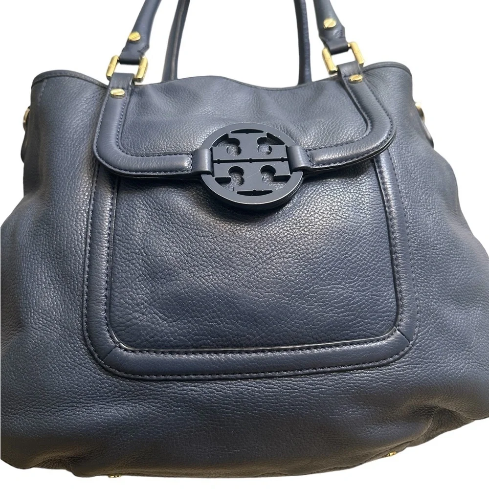 Tory Burch laying $495 11”