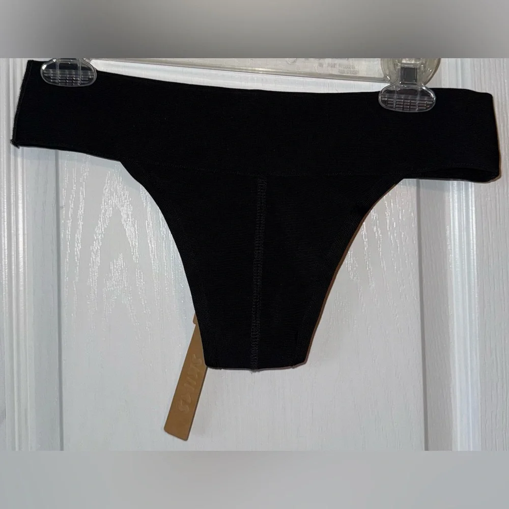 skims black