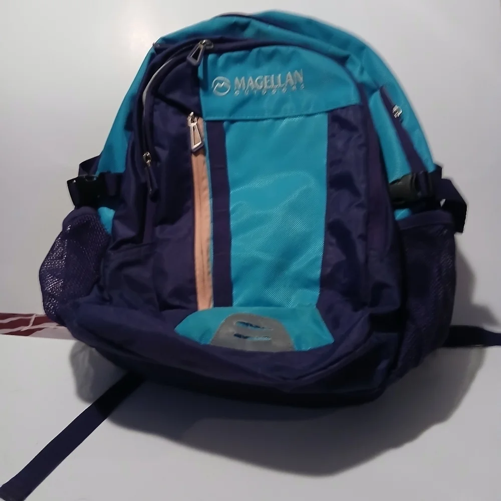 Magellan Outdoors Blue and Purple Backpack with Structured Design. Very Nice!!