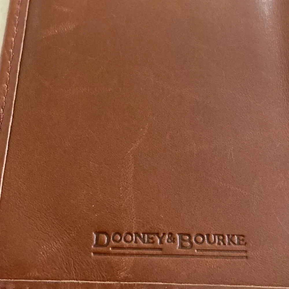 Dooney & Bourke Wallet Vintage leather clasp is silver leather imitation…