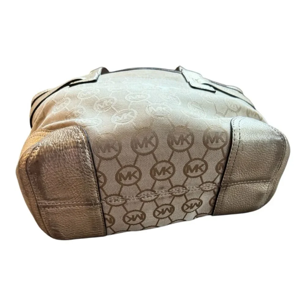 Michael Kors Small Monogrammed Leather Tote featuring the brand's signature logo