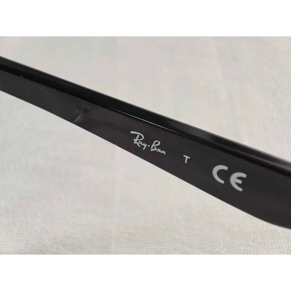 Ray-Ban RB‎ 7066 5943 Eyeglasses Frames Clear Transparent Black 52-17-140 Mint