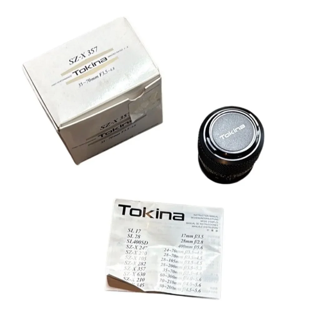 Tokina SZ-X 357 camera lens 49mm NIB
