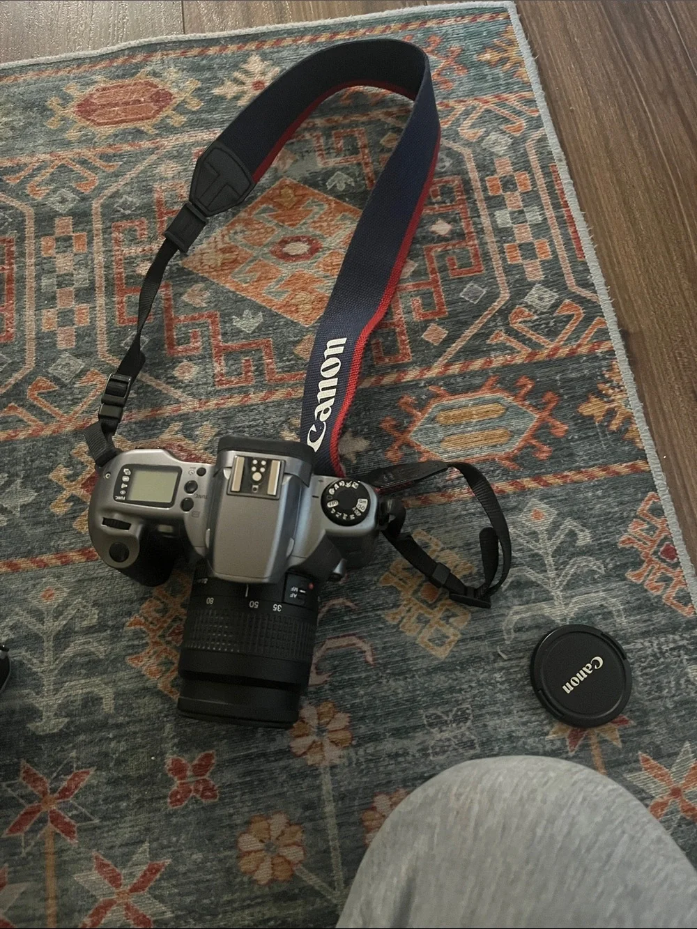 Not Tested/ Canon EOS Rebel Gii Camera in Black and Silver with Black Lens Cap