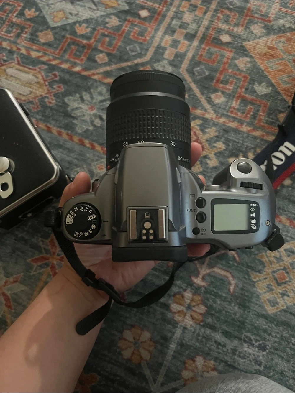Not Tested/ Canon EOS Rebel Gii Camera in Black and Silver with Black Lens Cap