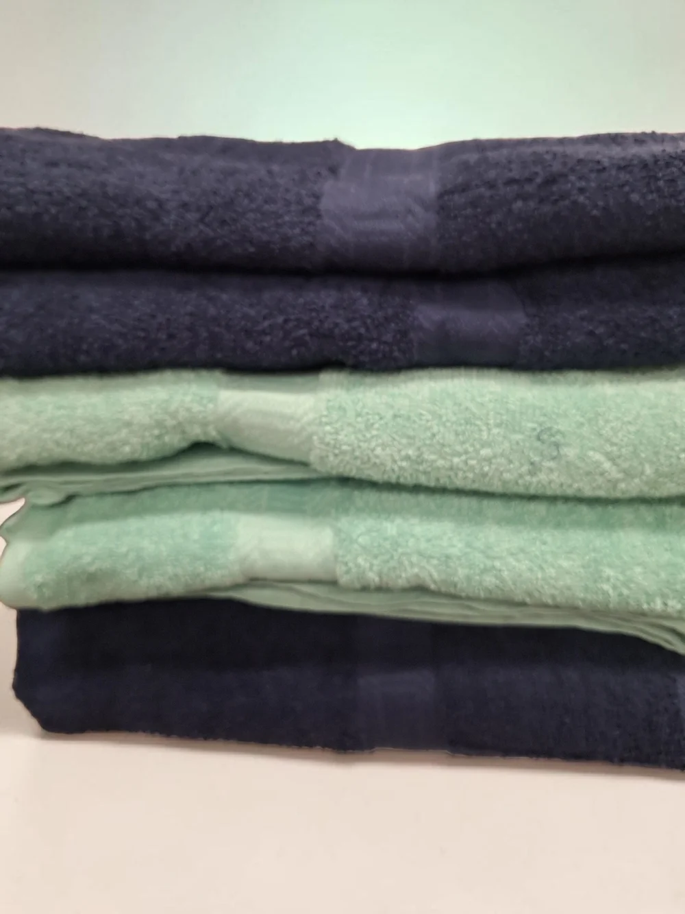 Stacked Plush Bath Towels in Navy and Mint