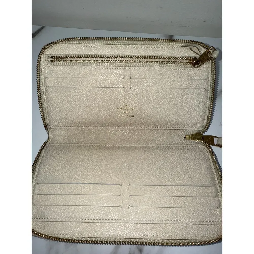 Louis Vuitton Zippy Wallet in Cream Empreinte Leather