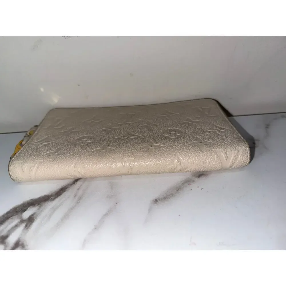 Louis Vuitton Zippy Wallet in Cream Empreinte Leather