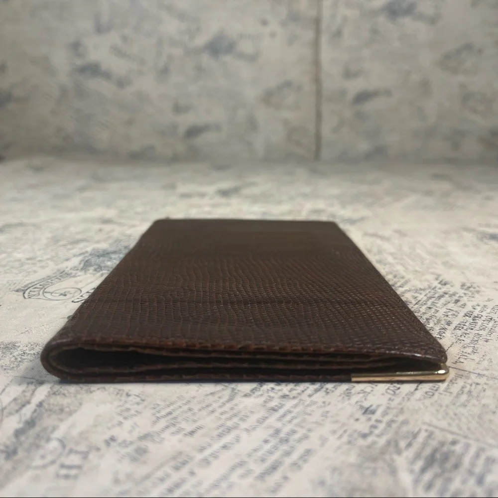 Smythson Antique lizard skin passport wallet with gold corners
