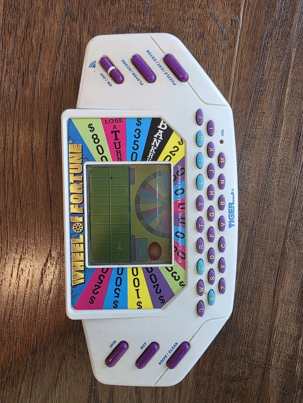 Vintage 1995 Tiger Electronics Wheel of Fortune Handheld Game with Cartridge 7