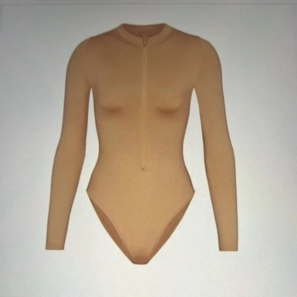 SKIMS swim zip