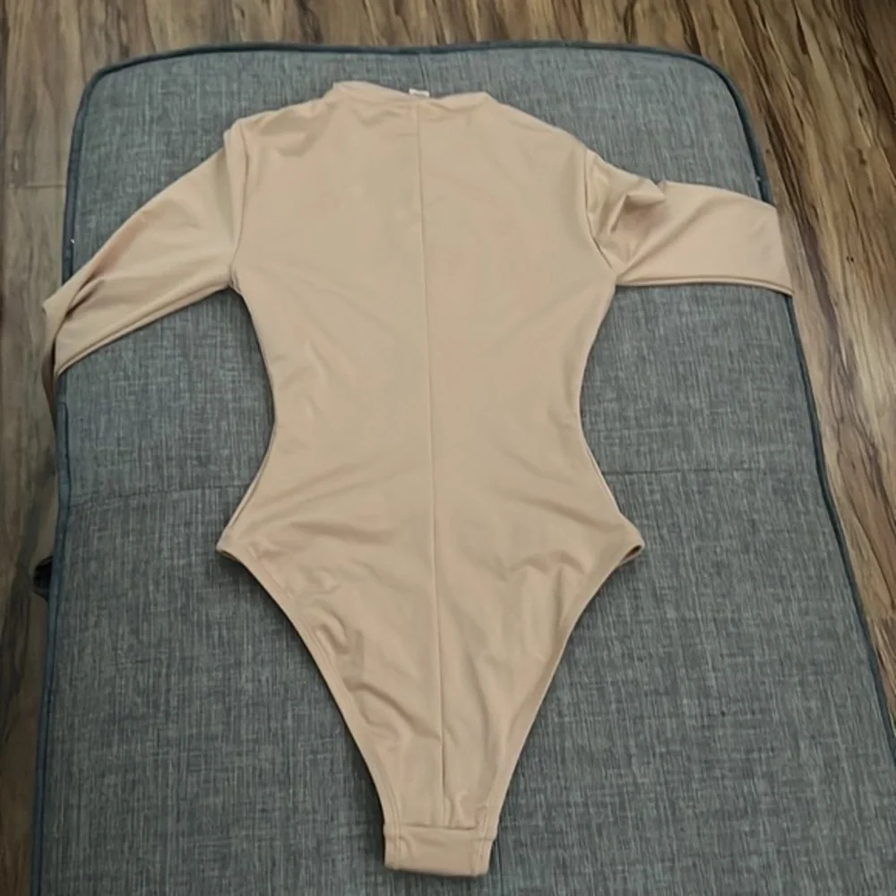 SKIMS swim zip