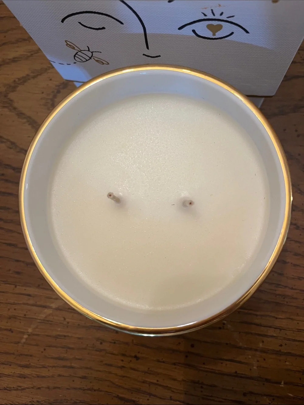 Jonathan Adler Muse Miel Double-Wick Candle in white porcelain