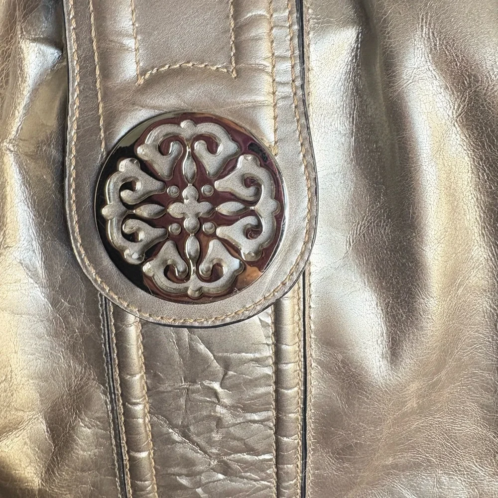 Solina Woman’s Metallic Silver Taupe Shoulder Bag with Decorative Medallion