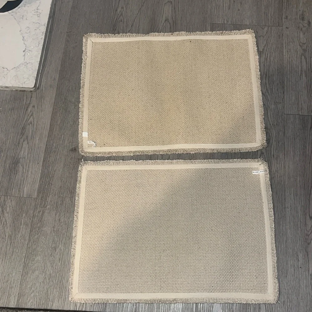 Two Pottery barn place mat.