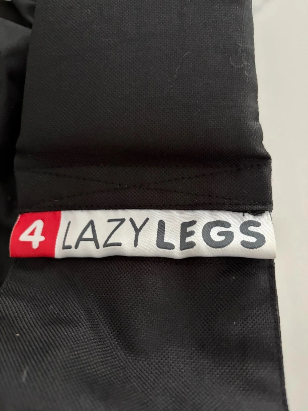 4 Lazy Legs Dog Pouch Adjustable Carrier. Like new. Bought in the UK. Black.