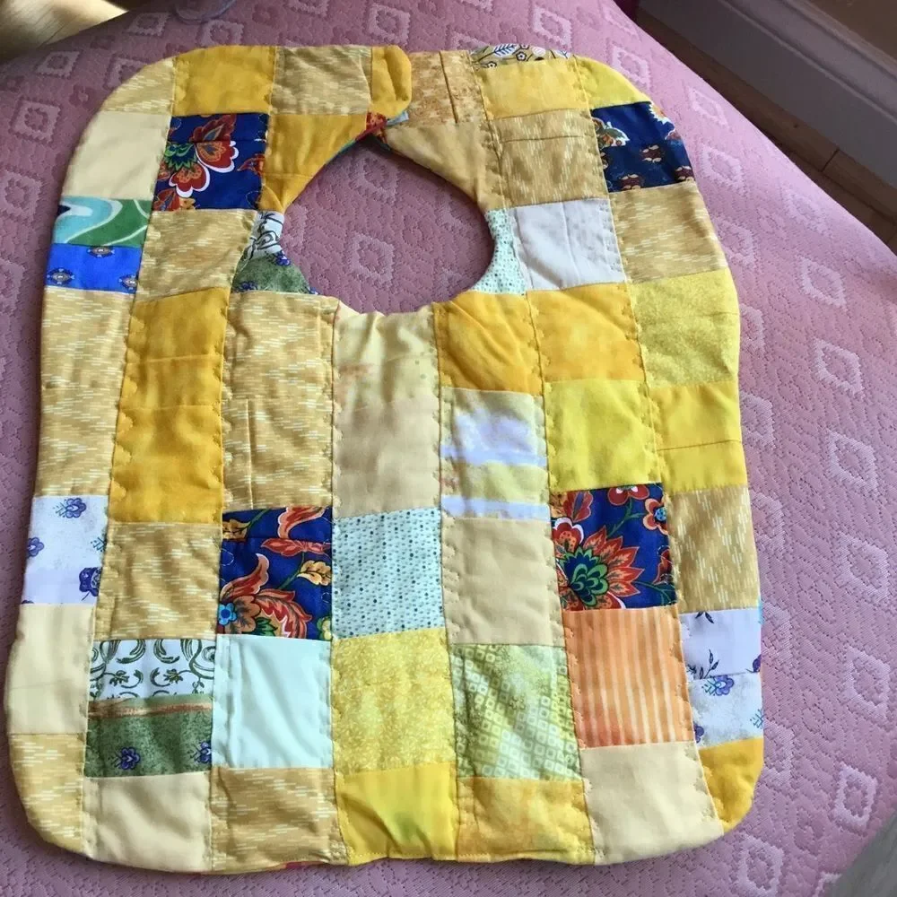 3/$25 or $12 each. Yellow Hand Crafted Quilted Reversible Baby Bib