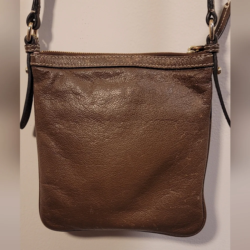 Dooney & Bourke front strap loved