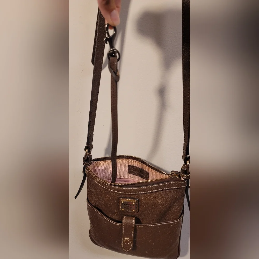 Dooney & Bourke slip zippered pocket