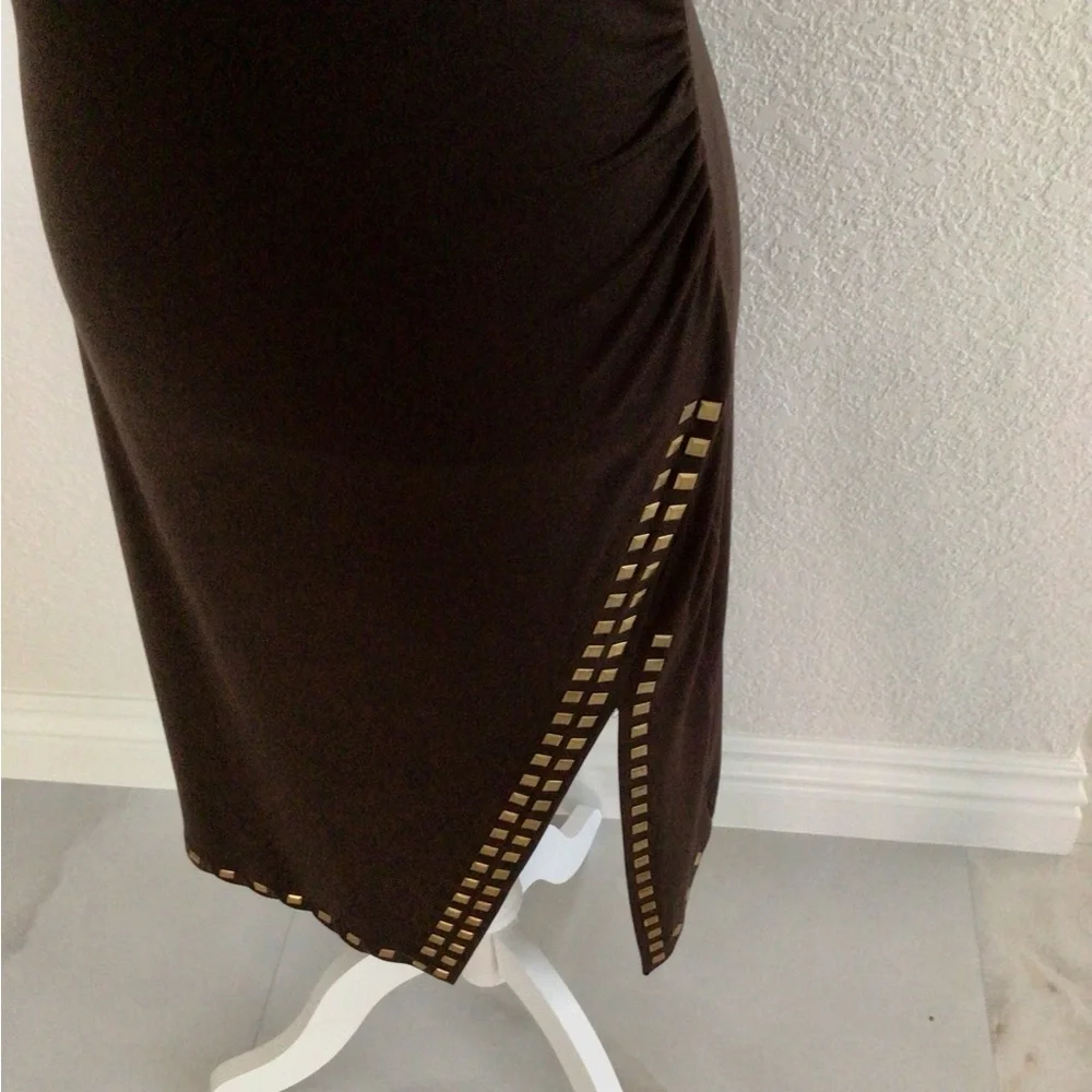 Michael Kors asymmetrical upscale features