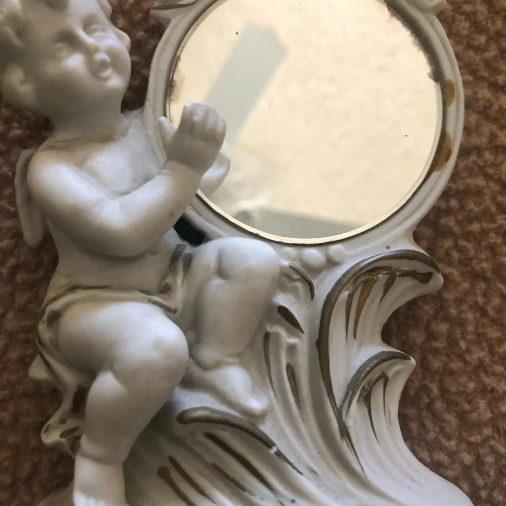 White Cherub Accent Mirror with Floral Motif And Bisque Two White Roses