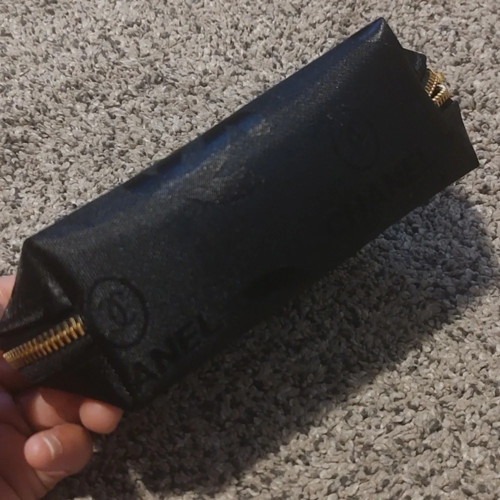 CHANEL Black Textured Pouch with Subtle Logo