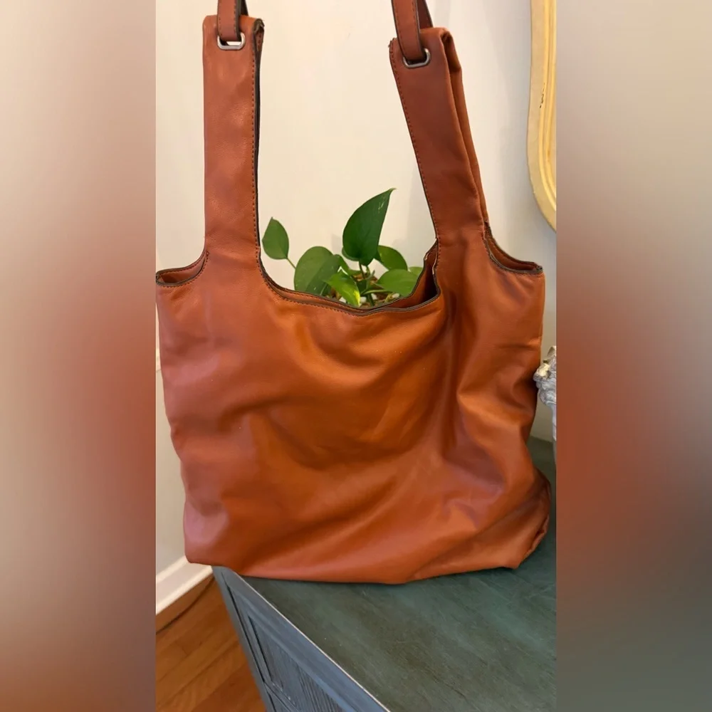 Zara faux leather handbag, adjustable straps, and very roomy.