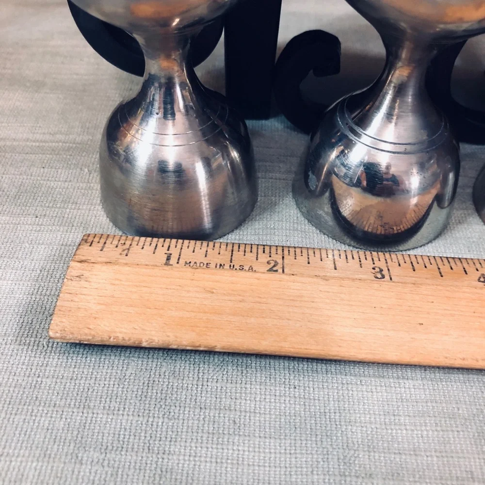 Set of Dansk Jette Stainless Steel flatware and / Four Stainless Steel Pegs
