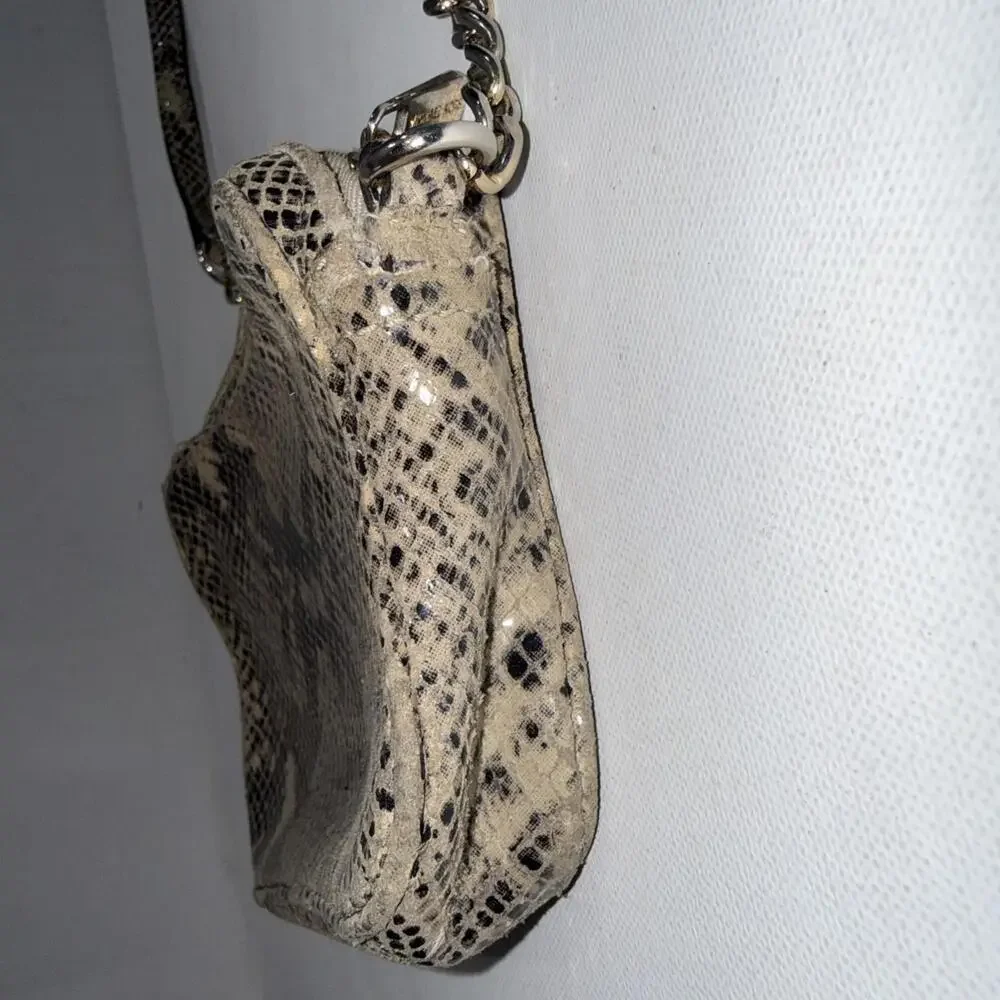 Michael Kors household passing