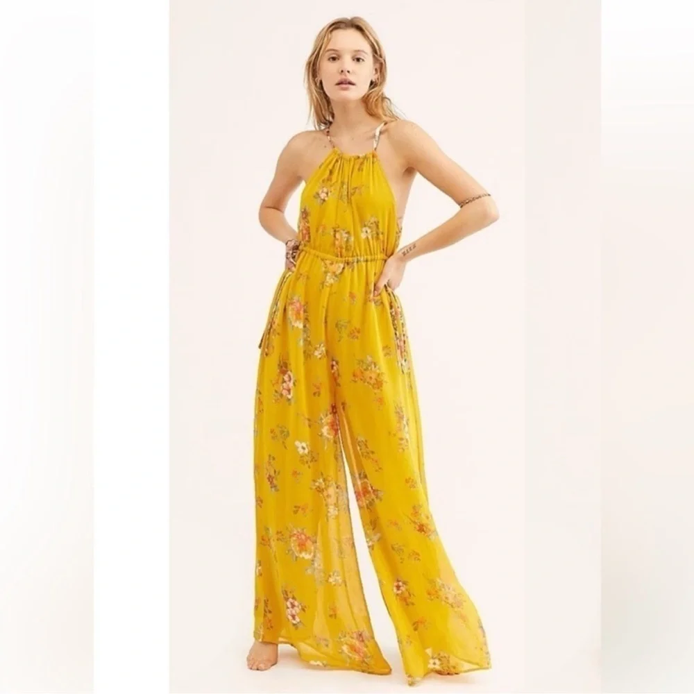Free people - Georgia Yellow floral jumpsuit size XS( flaw)