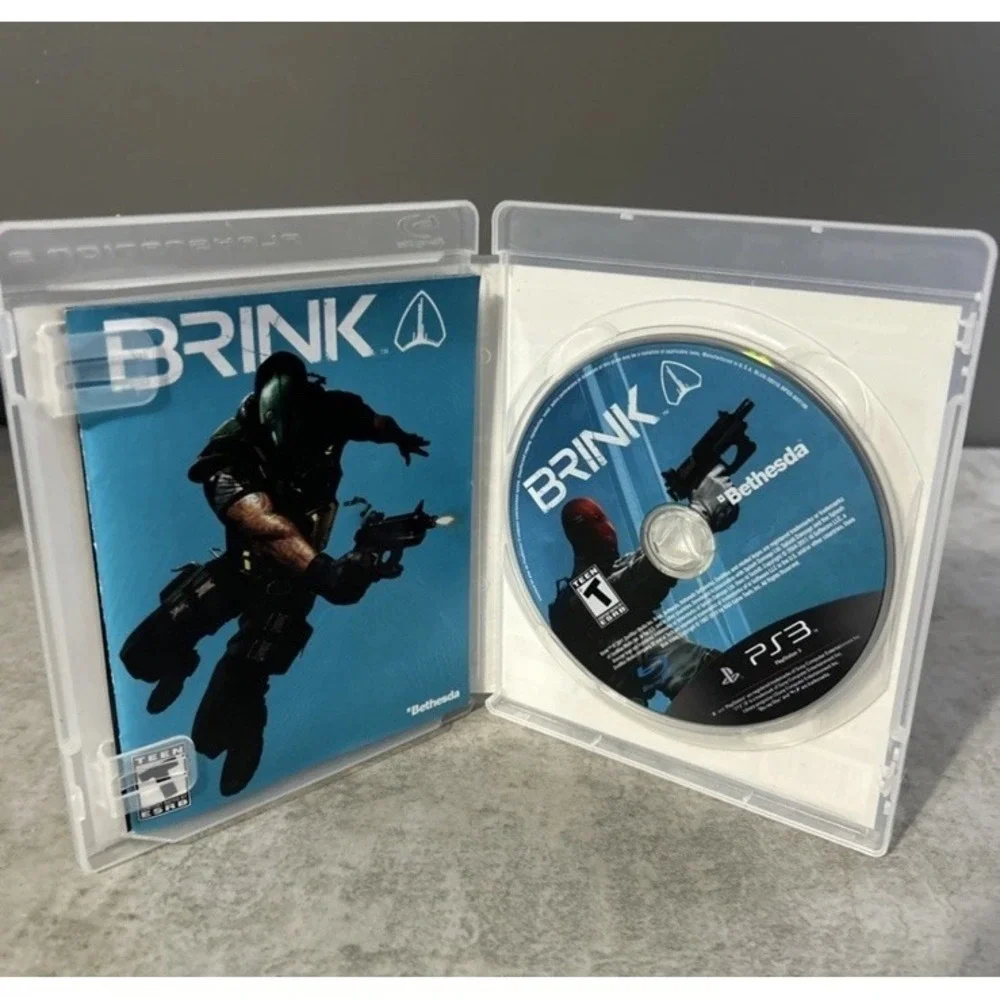 Lot of 4 Sony PS3 Games Brink Mass Effect 2 Uncharted 3 Socom 4 CIB