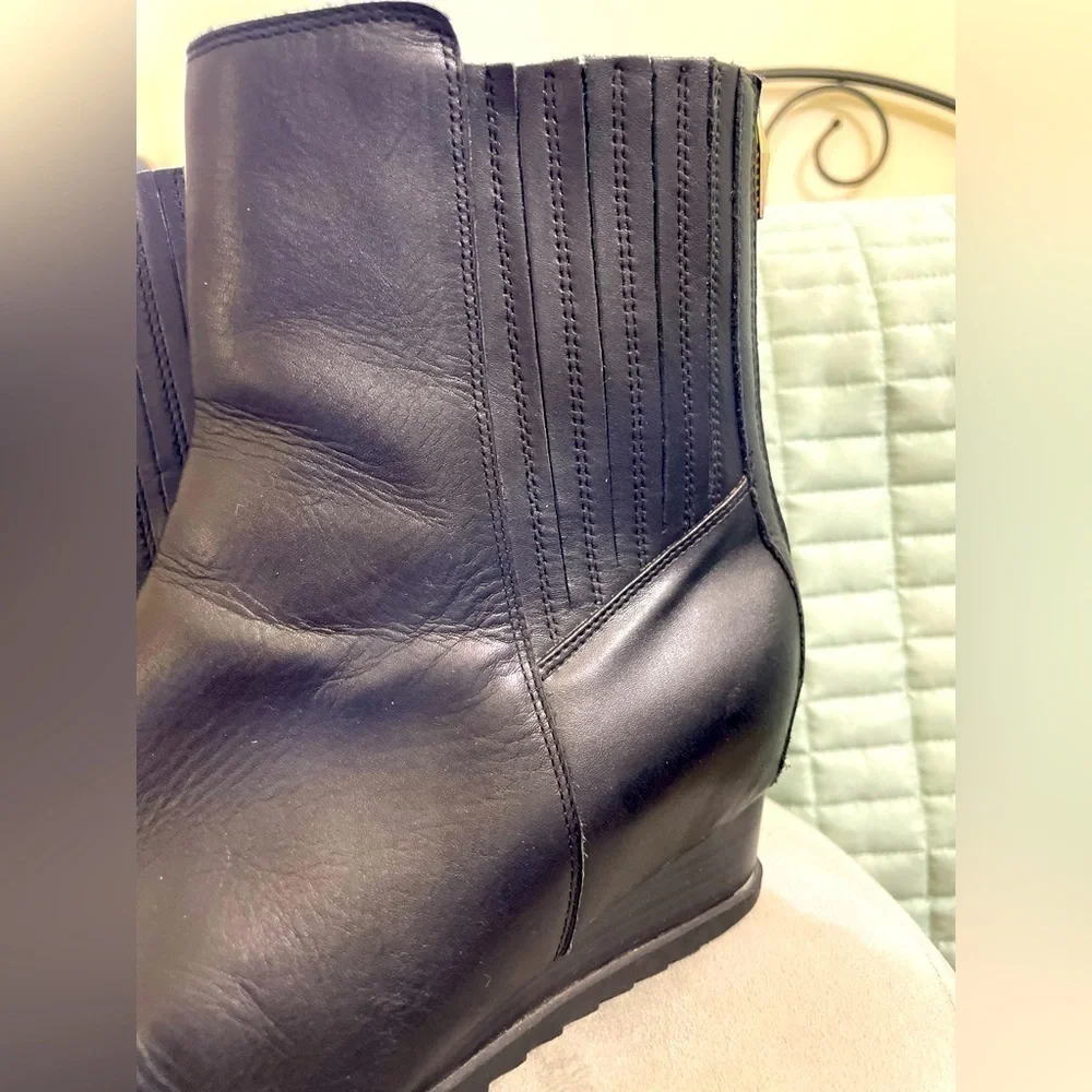 Calvin Klein Judith wedge ankle boots, 100% leather. Super comfortable and cute.