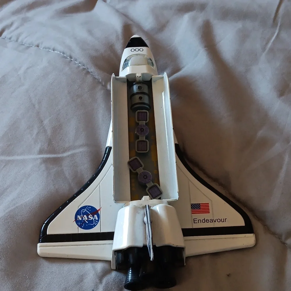 Rocket friction powered Endeavor Nasa metallic
