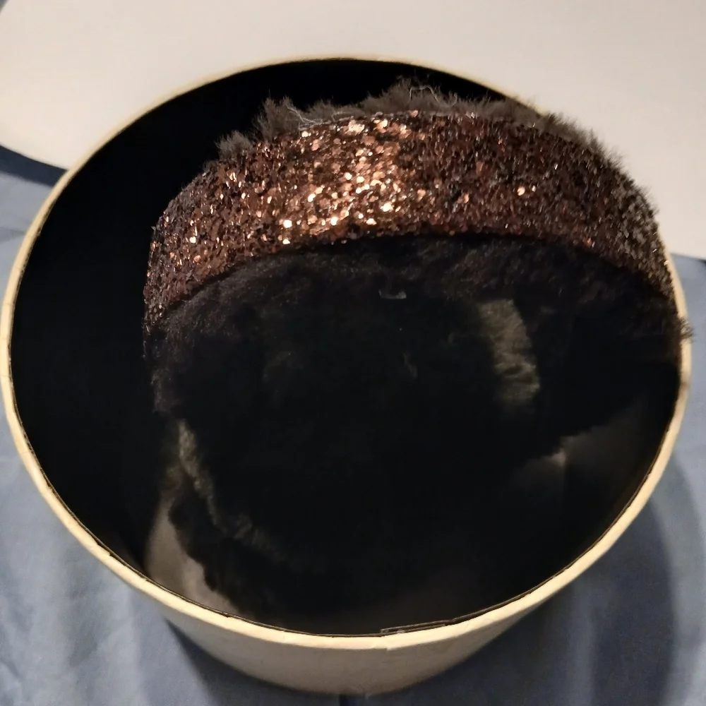 UGG Youth Girls Black With Purple Sequin Earmuffs.