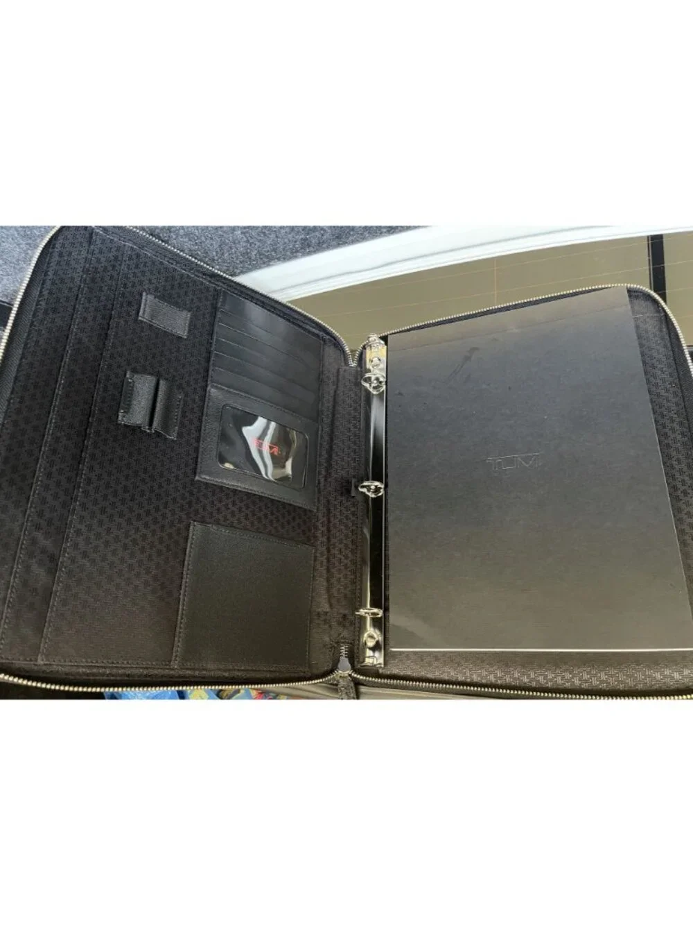 Tumi black leather