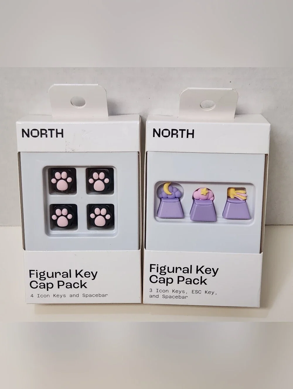 NORTH Figural Keycap Packs - Pink Paw & Purple Icon Sets