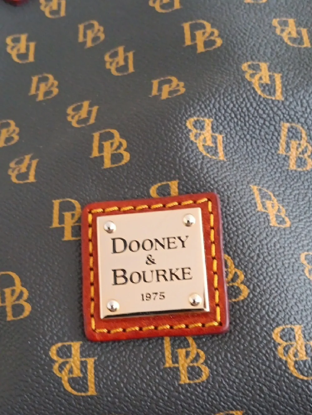 Dooney & Bourke Brown Monogram Handbag with Tan Leather Accents