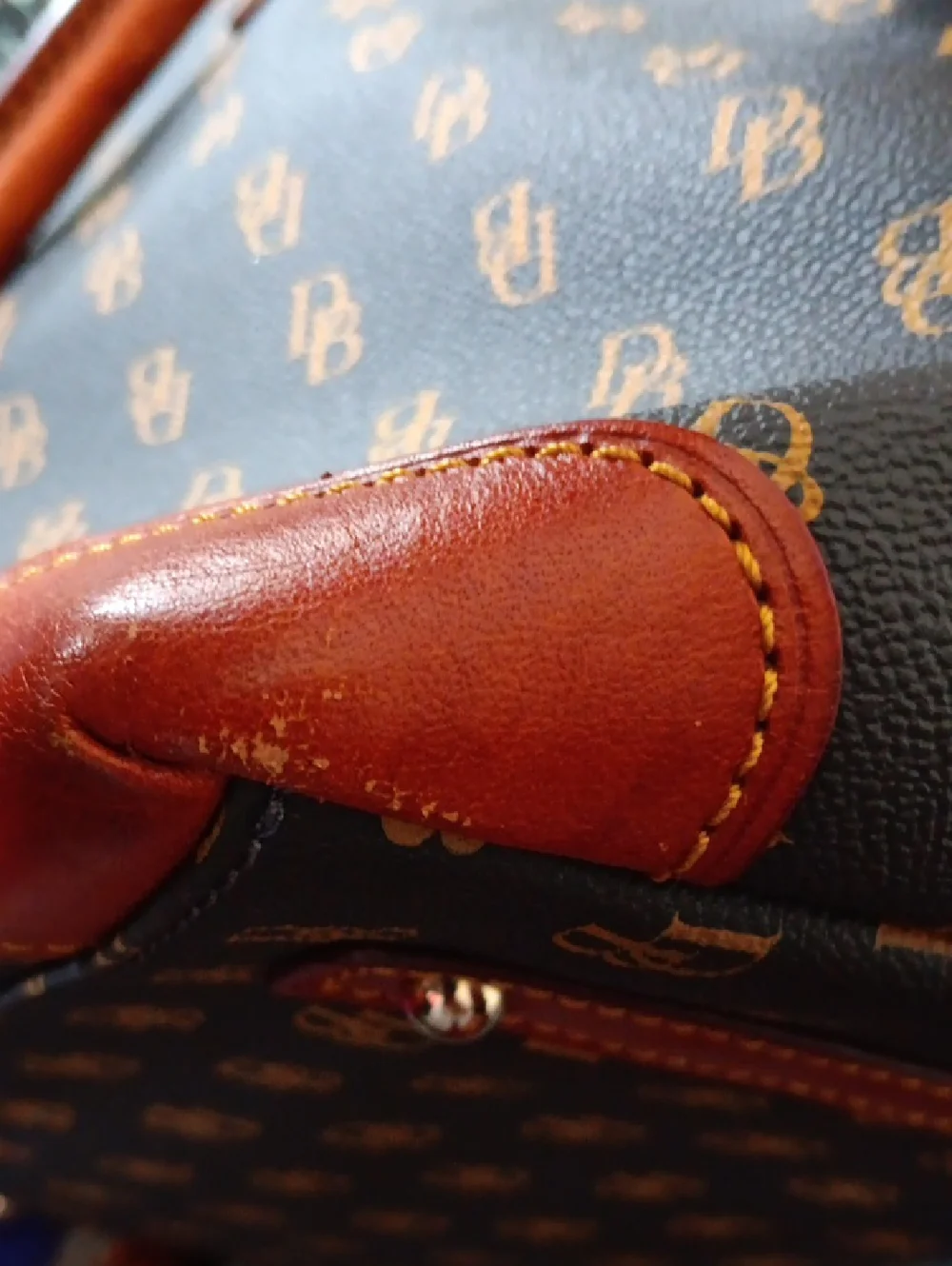 Dooney & Bourke Brown Monogram Handbag with Tan Leather Accents