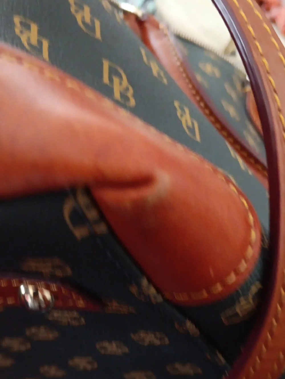 Dooney & Bourke Brown Monogram Handbag with Tan Leather Accents