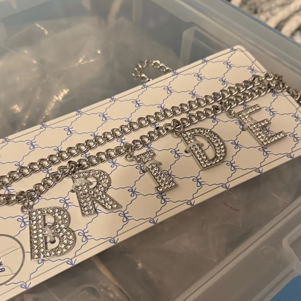 Twig & Arrow rhinestone embellished