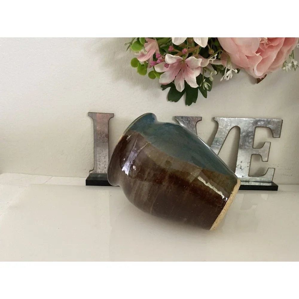 Signed byJen O blue brown