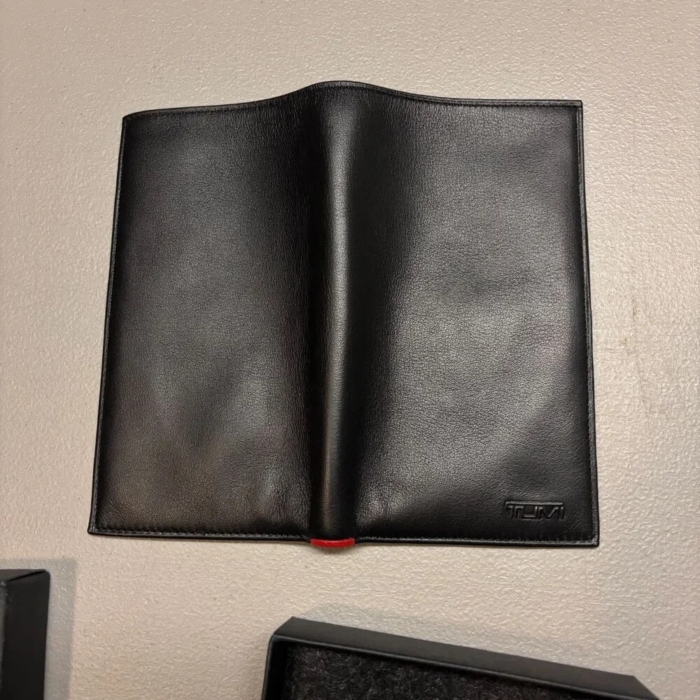 Tumi global leather