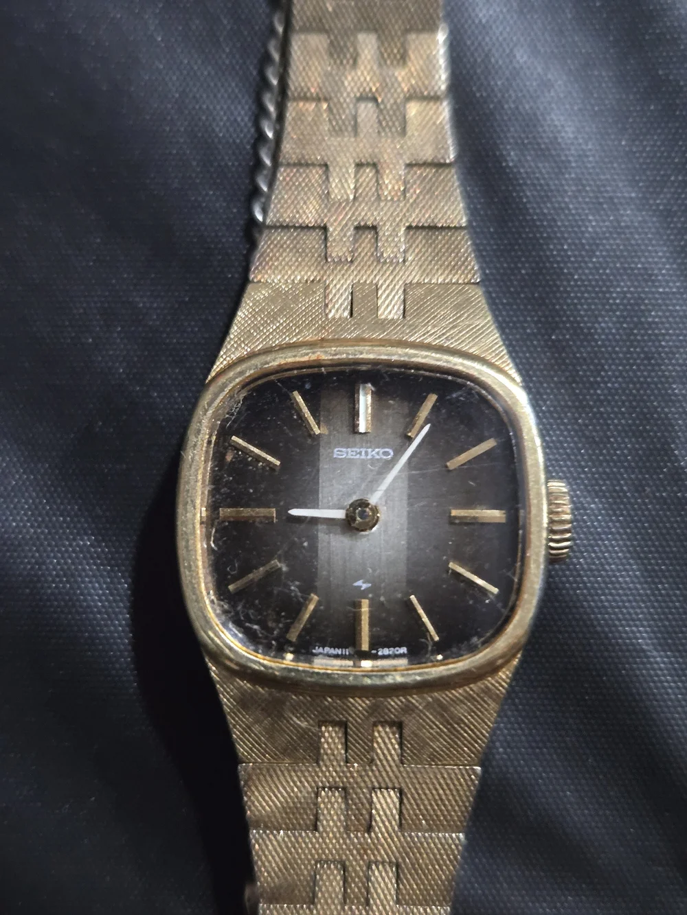 Seiko Gold Tone Ladies Analog Bracelet Watch with Black Dial